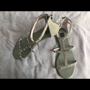 Moss green gladiator sandals.